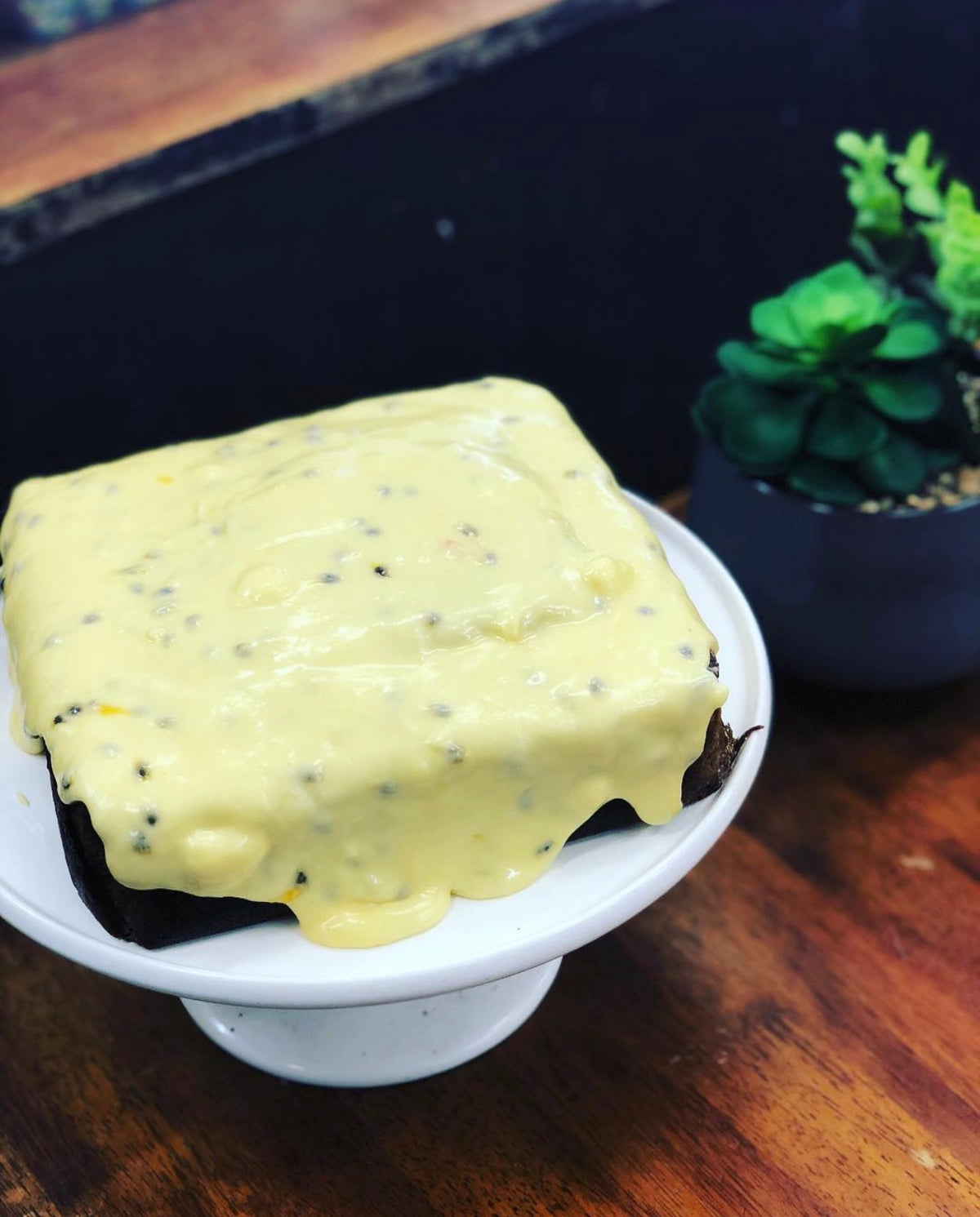 Banana cake w/ passionfruit icing
